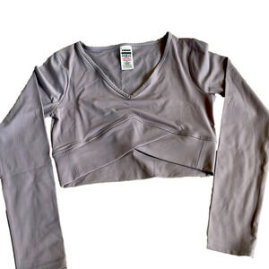 Gymshark cross over long sleeve crop top in lavender slate size small.